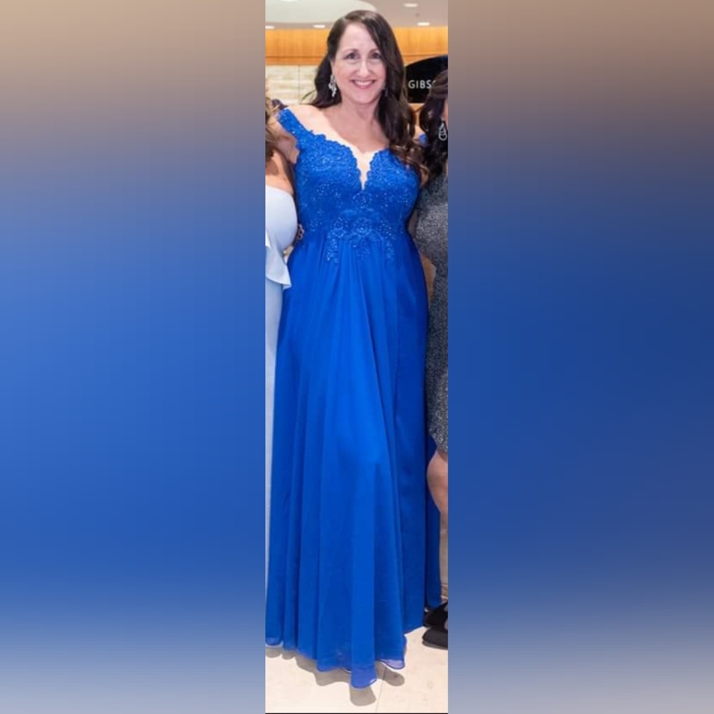 Full length formal dress with beaded bodice. Size 10